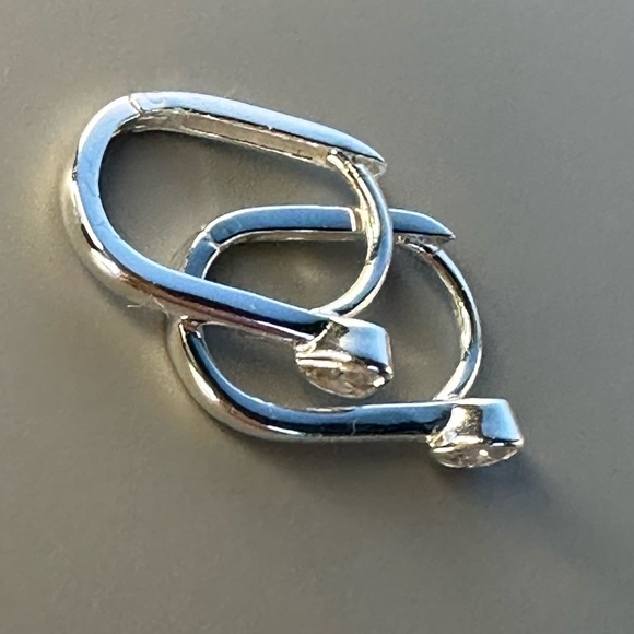 Sterling Silver Heart CZ Oval Huggie Earrings - Picture 5 of 9